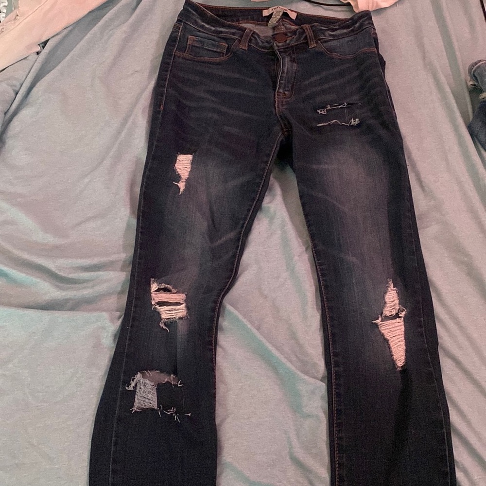 Charlotte russe jeans, size two. Custom rips and distressed bottoms.